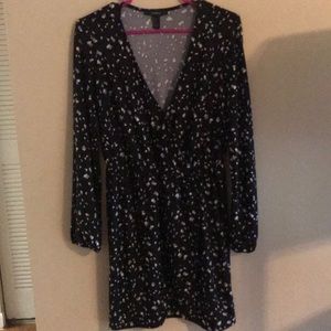 Short, black dress with white and gray. Never worn
